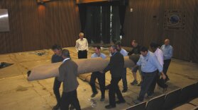 photo: damaged carpet being removed from lake macquarie city council chambers, following flood damage during the june 2007 storm