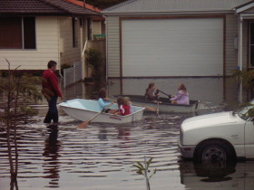 photo: children playing in flood waters burke street swansea