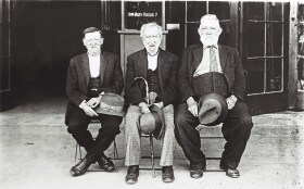 photo: three old gentlemen outside the star theatre circa 1929l