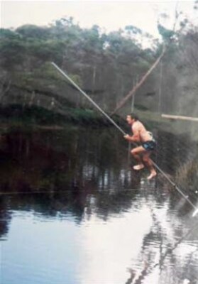 photo: competitor taking part in australian canal jumping championships held at wyee, 22 january 1983